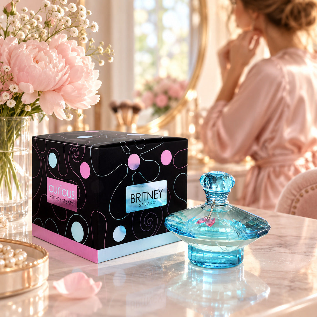 Britney Spears Curious Eau de Parfum on a dressing table